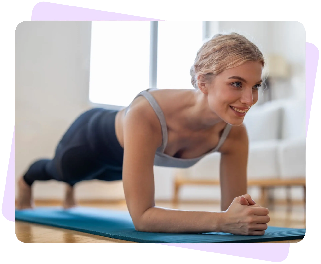 Woman doing a plank exercise indoors.